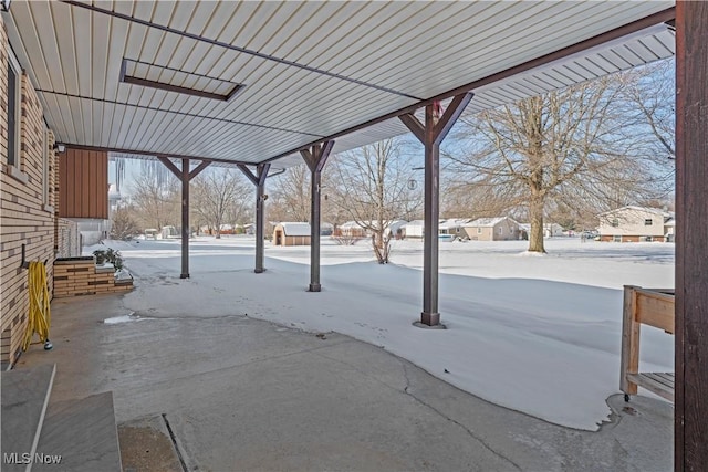 view of snow covered patio