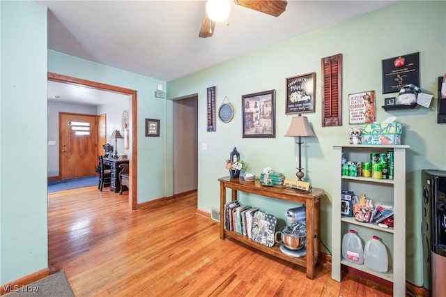 hallway featuring light hardwood / wood-style flooring