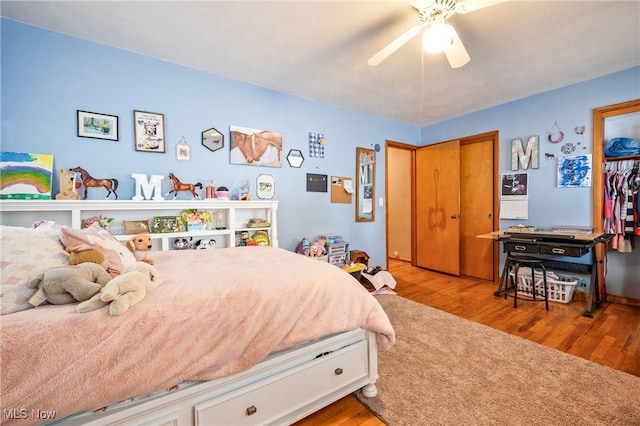 bedroom with ceiling fan and light wood-type flooring