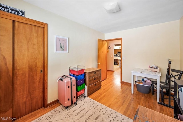 recreation room with light hardwood / wood-style floors