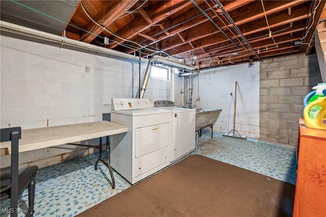 laundry area with sink and washer and dryer