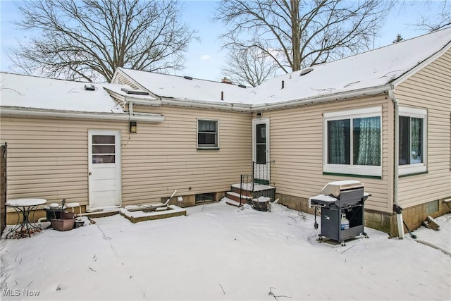 view of snow covered property