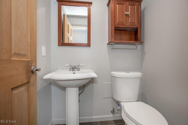 bathroom featuring toilet