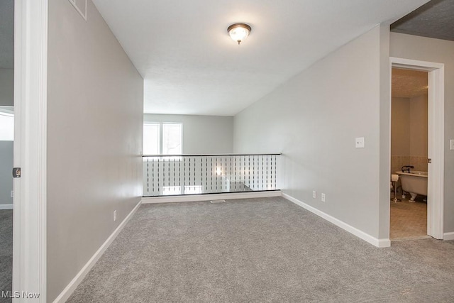 bonus room with carpet floors