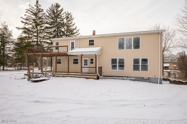 view of snow covered property