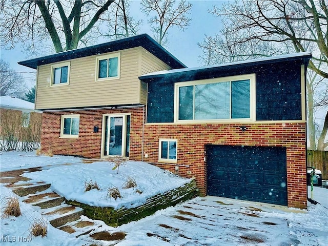 view of front of property with a garage