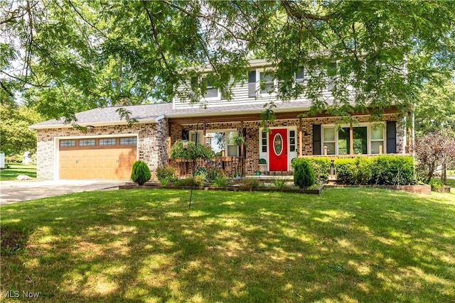 view of front of house with a garage and a front lawn