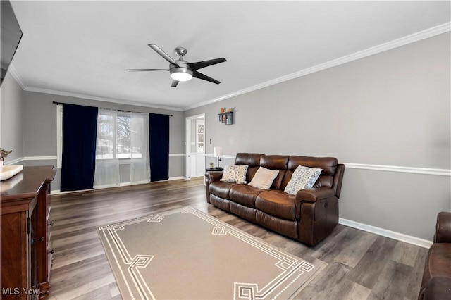 living room with crown molding, hardwood / wood-style flooring, and ceiling fan