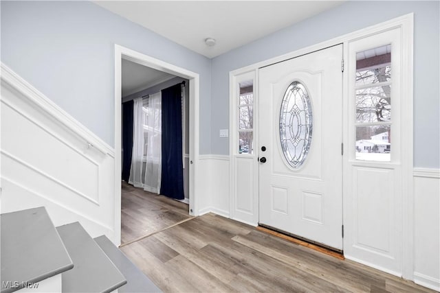 foyer with light hardwood / wood-style floors