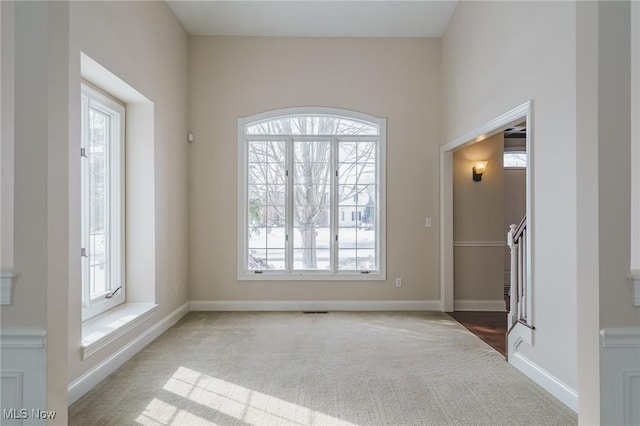 spare room featuring carpet