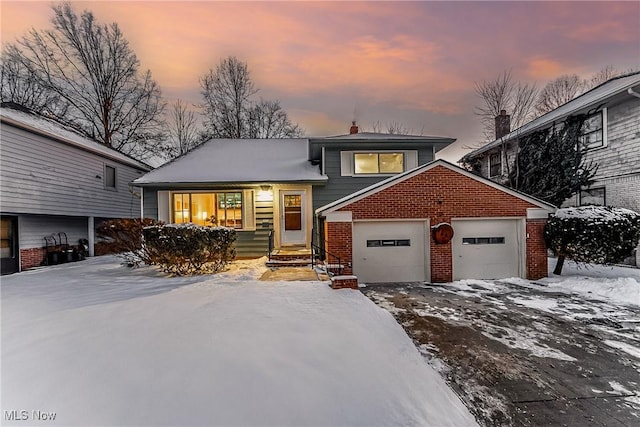 tri-level home featuring a garage