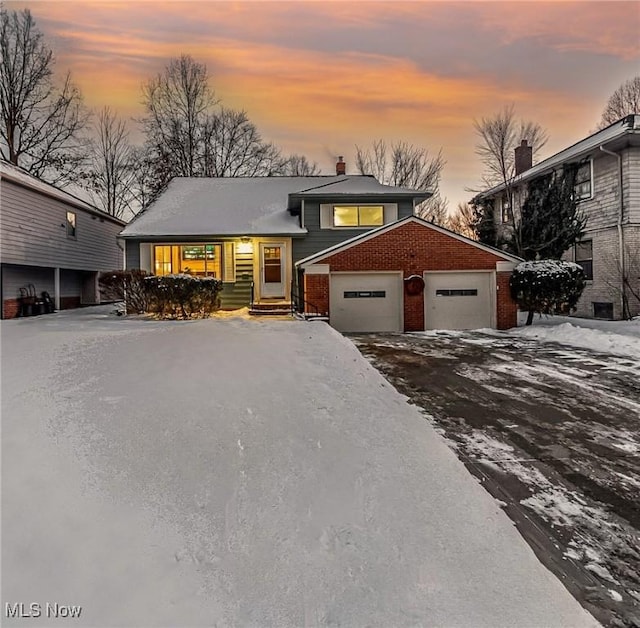 tri-level home featuring a garage