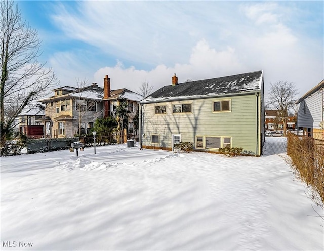 view of snow covered property