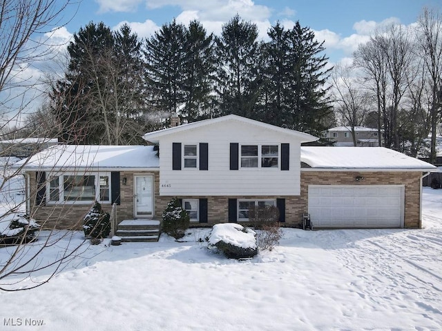 tri-level home featuring a garage