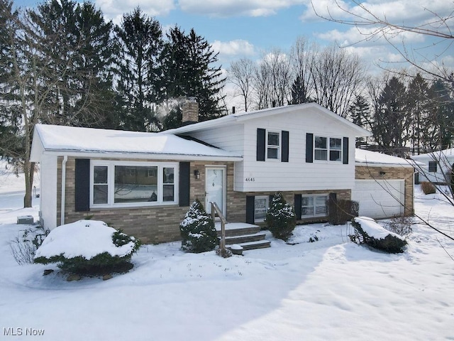 tri-level home with a garage