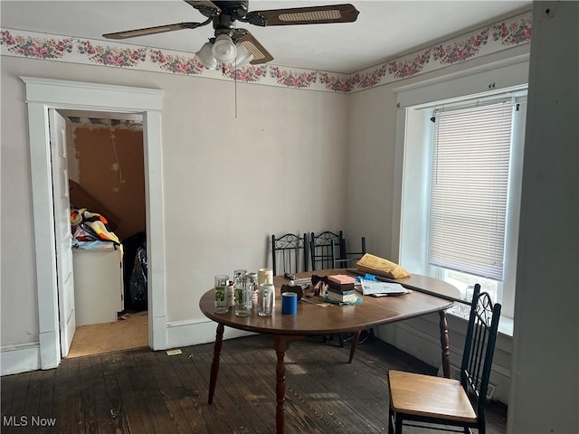 dining area with dark wood-type flooring