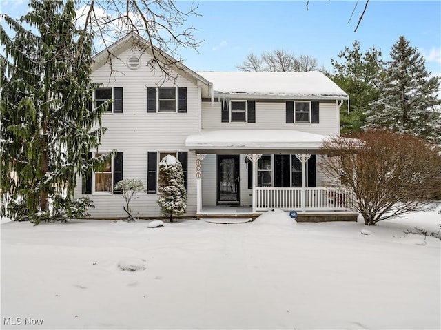 view of front of property featuring covered porch