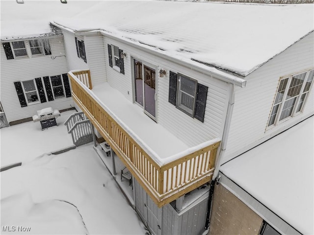 view of snow covered deck