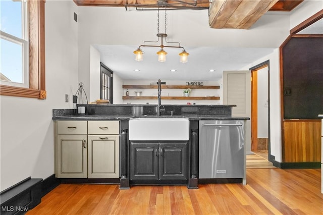 kitchen with sink, stainless steel dishwasher, pendant lighting, and light wood-type flooring