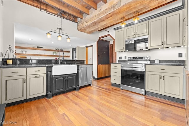 kitchen with sink, gray cabinets, beamed ceiling, and appliances with stainless steel finishes