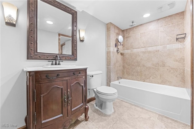 full bathroom with tile patterned floors, tiled shower / bath combo, vanity, and toilet