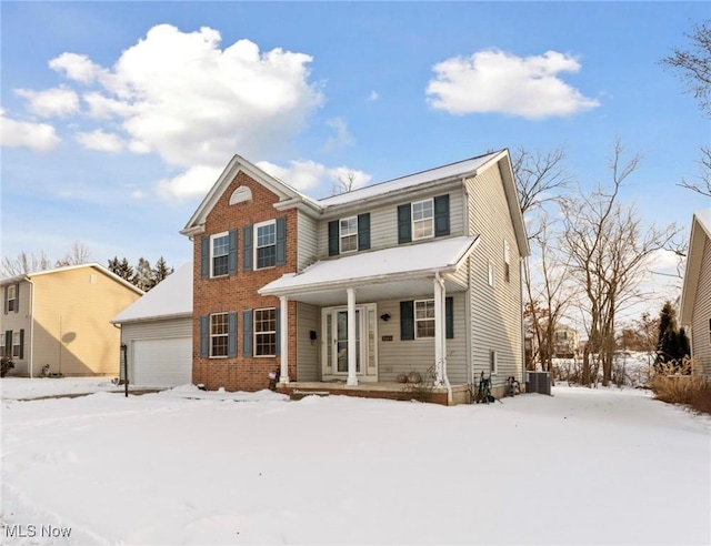 view of front of house featuring a porch, a garage, and central air condition unit