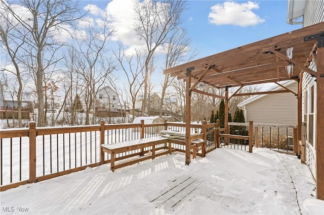 view of snow covered deck