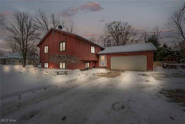 view of front of property with a garage