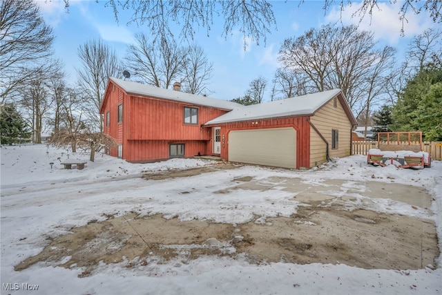 exterior space with a garage