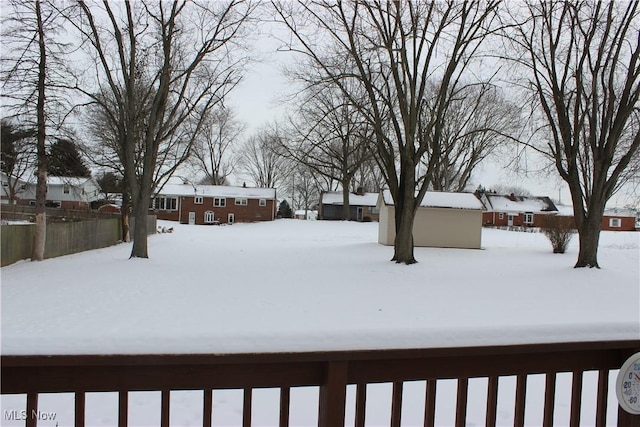 view of yard covered in snow