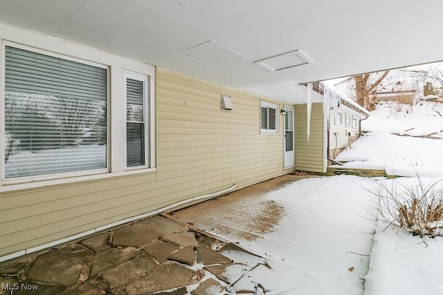 view of snow covered patio