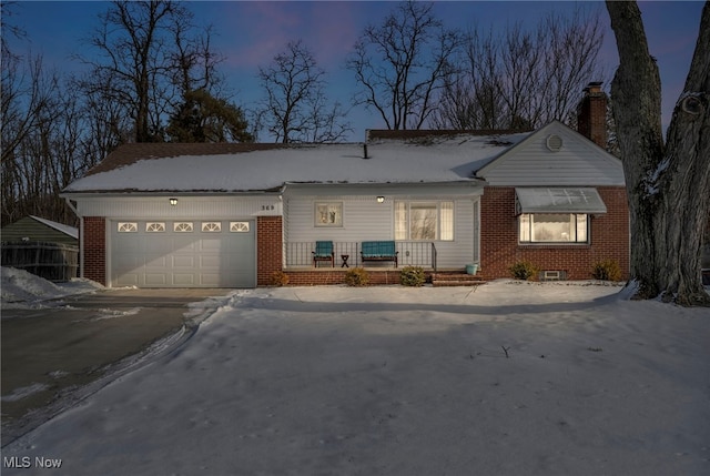 single story home featuring a garage