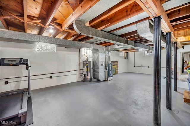 basement with gas water heater and heating unit