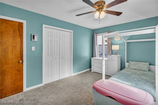 bedroom featuring a closet, ceiling fan, and carpet floors