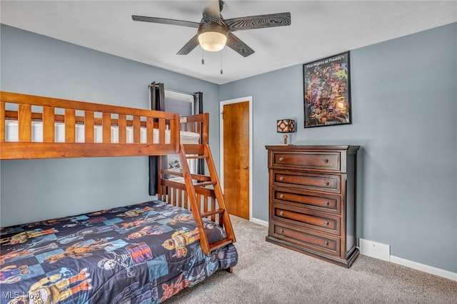 bedroom featuring ceiling fan and carpet floors