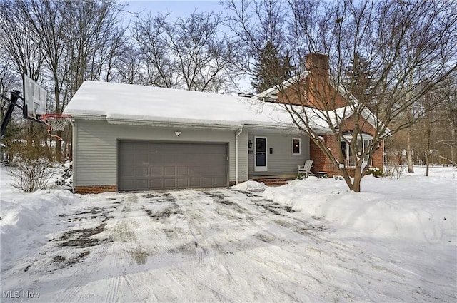 single story home with a garage