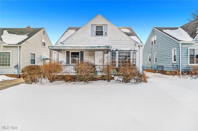 view of snow covered house