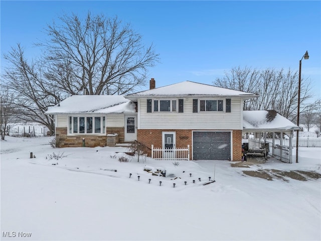 split level home with a garage