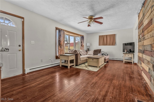 living room featuring hardwood / wood-style flooring, a baseboard radiator, a textured ceiling, and ceiling fan