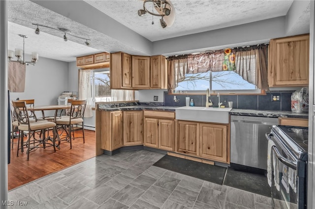 kitchen with sink, range with electric cooktop, a textured ceiling, and dishwasher