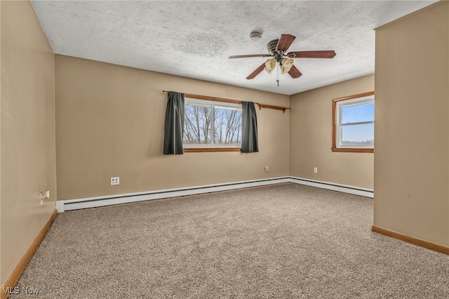 carpeted spare room with ceiling fan, a baseboard heating unit, and a textured ceiling