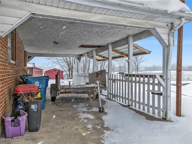 view of snow covered patio