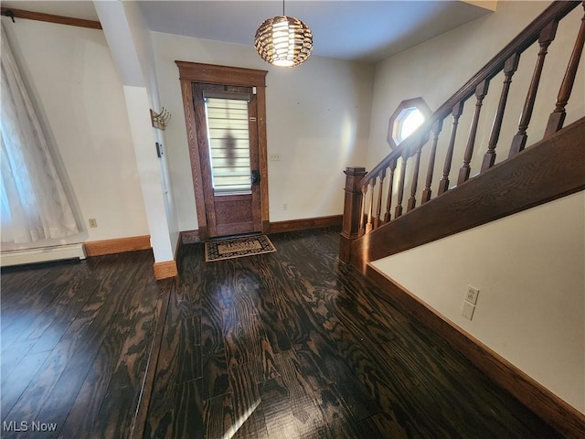 foyer featuring a baseboard radiator and dark hardwood / wood-style flooring