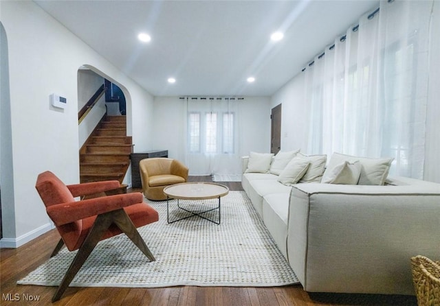 living room featuring dark hardwood / wood-style flooring