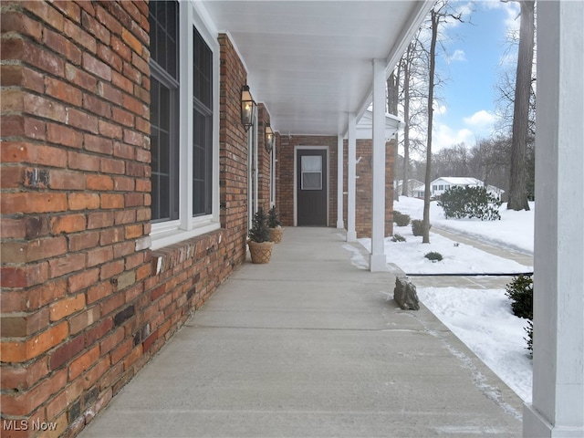 view of snow covered patio