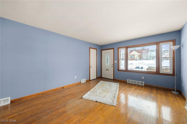 foyer entrance featuring hardwood / wood-style flooring