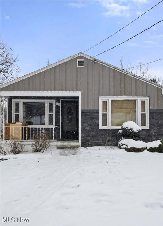 view of snow covered property