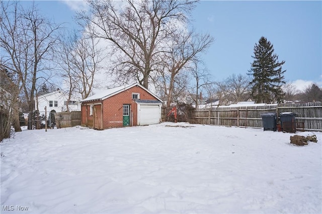 view of yard layered in snow