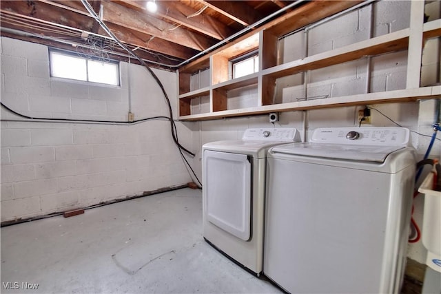 washroom featuring washer and clothes dryer