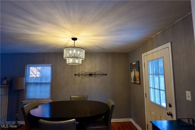 dining space featuring dark hardwood / wood-style flooring